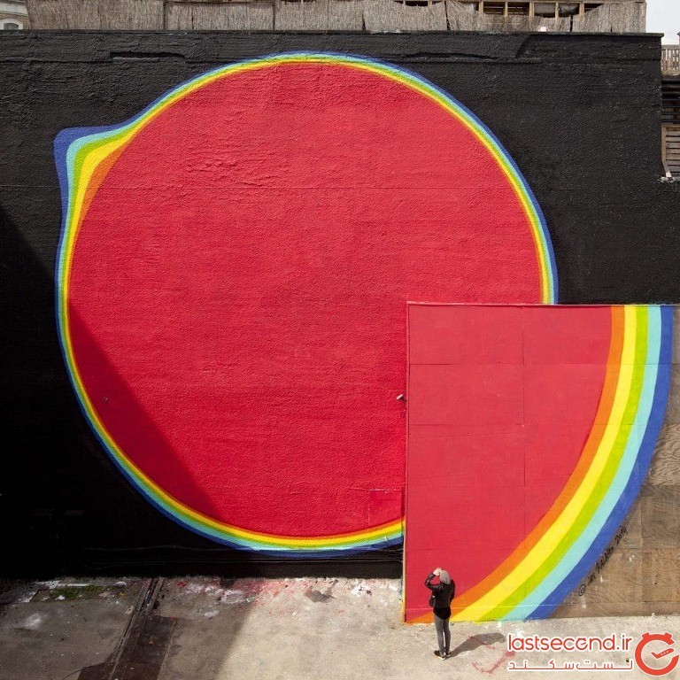 یک هنرمند خیابانی، نقاشی‌های دیواری از رنگین کمان خلق کرده