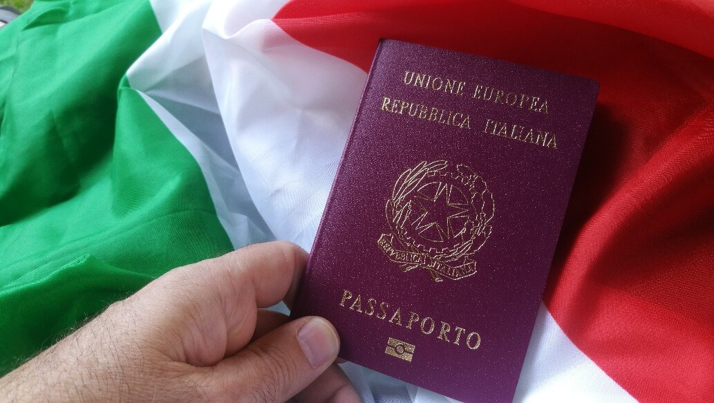 italian-european-passport-on-italy-flag.jpg