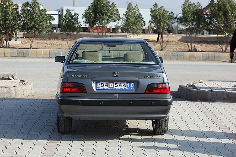 lastsecond.ir-travel-to-tajikistan-by-car-transit-plaque.jpg